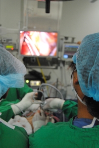 Looking over the shoulder of Dr. Gonzalez Rivas in the operating room