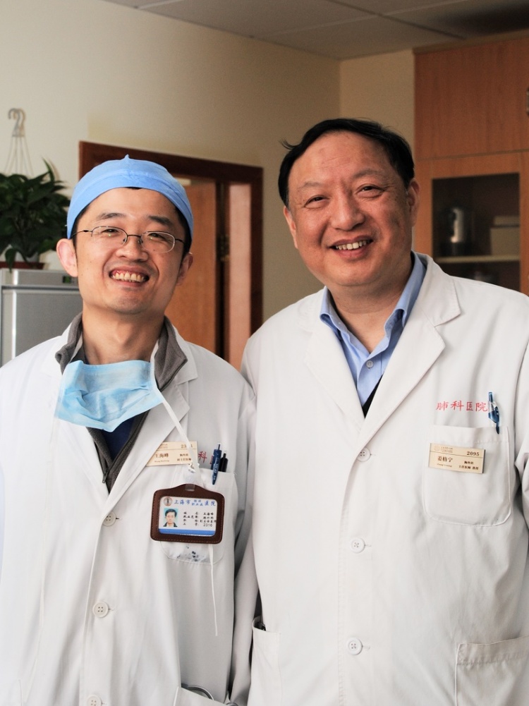 Dr. HaiFeng Wang with Dr. Jiang Gening (right)